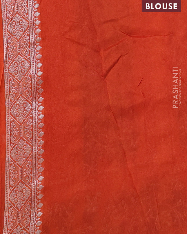 Banarasi semi raw silk saree orange with silver zari weaves and mina border