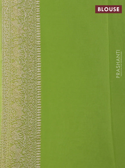 Pure banarasi georgette saree fluorescent green with allover zari weaves and woven border