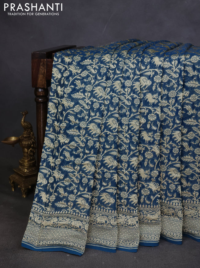 Pure banarasi georgette saree peacock blue with allover zari weaves and woven border