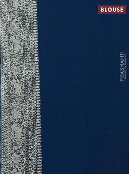 Pure banarasi georgette saree peacock blue with allover zari weaves and woven border