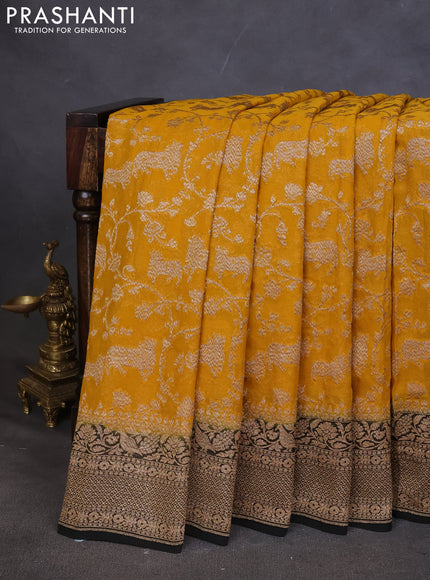Pure banarasi georgette saree mustard yellow and black with allover zari weaves and woven border