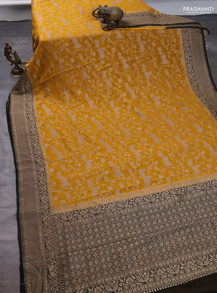 Pure banarasi georgette saree mustard yellow and black with allover zari weaves and woven border