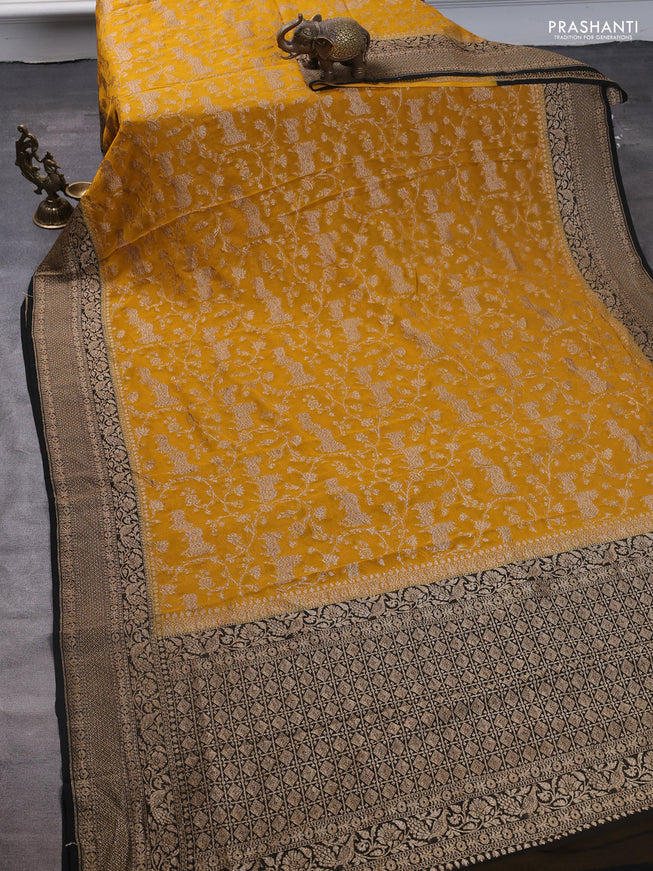 Pure banarasi georgette saree mustard yellow and black with allover zari weaves and woven border