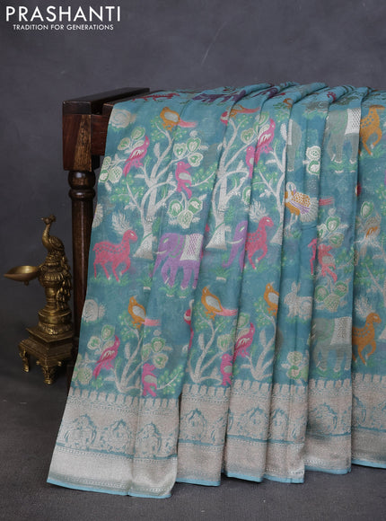 Art chiffon saree pastel blue with allover mina weaves and woven border