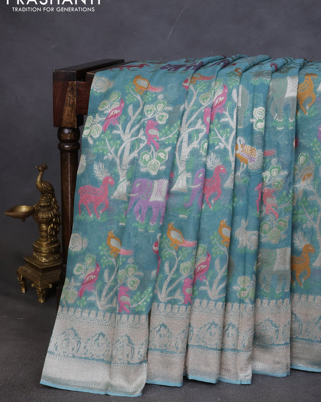 Art chiffon saree pastel blue with allover mina weaves and woven border