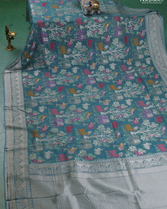 Art chiffon saree pastel blue with allover mina weaves and woven border