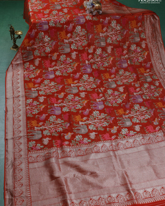 Art chiffon saree orange with allover mina weaves and woven border