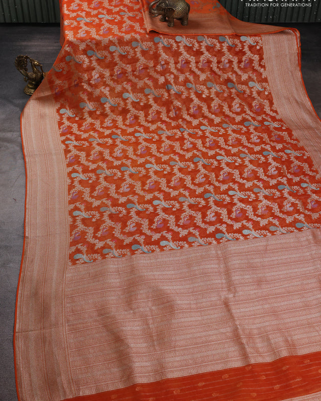 Art chiffon saree orange with allover zari & mina weaves and silver zari woven border