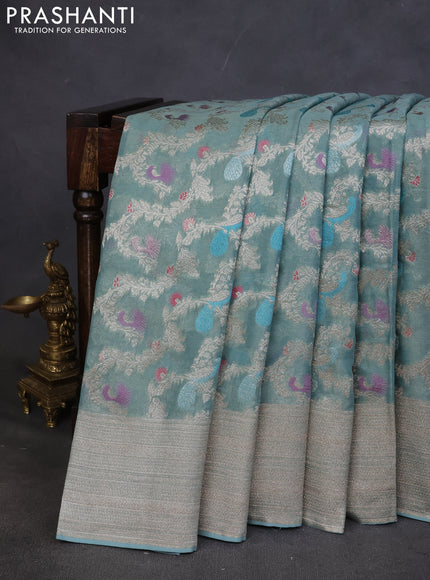 Art chiffon saree pastel blue with allover zari & mina weaves and silver zari woven border