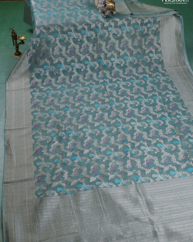 Art chiffon saree pastel blue with allover zari & mina weaves and silver zari woven border