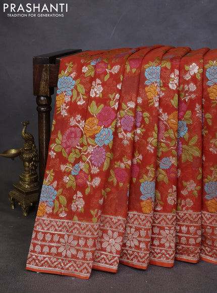 Art chiffon saree orange with allover mina weaves and woven border