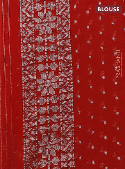 Art chiffon saree orange with allover mina weaves and woven border