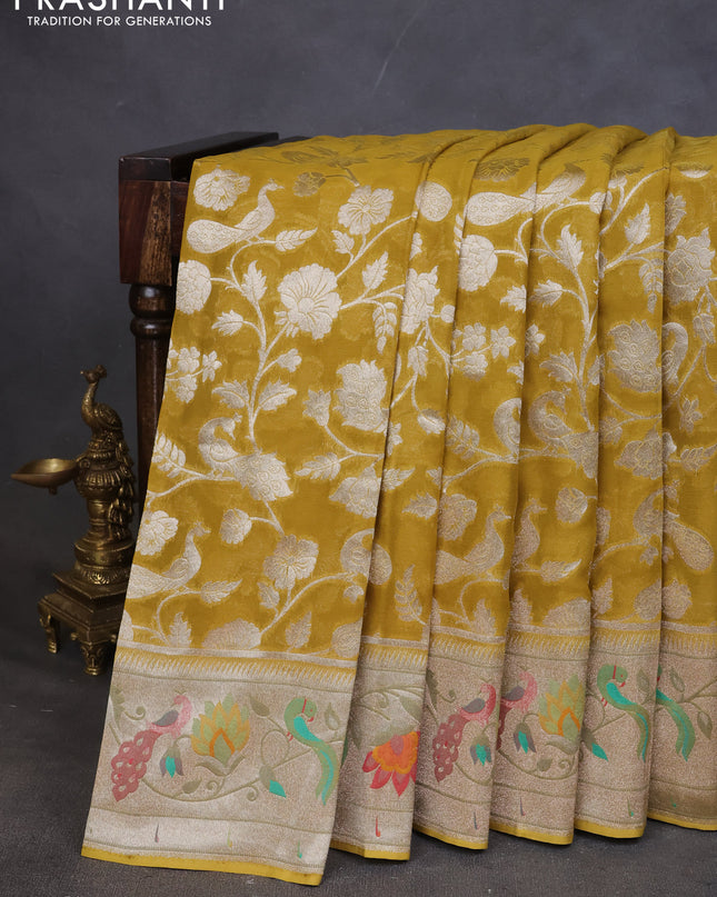 Art chiffon saree lime yellow with allover zari woven brocade weaves and zari woven paithani border