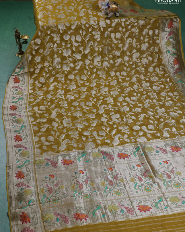 Art chiffon saree lime yellow with allover zari woven brocade weaves and zari woven paithani border