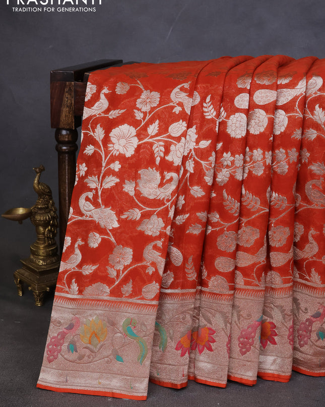 Art chiffon saree orange with allover zari woven brocade weaves and zari woven paithani border