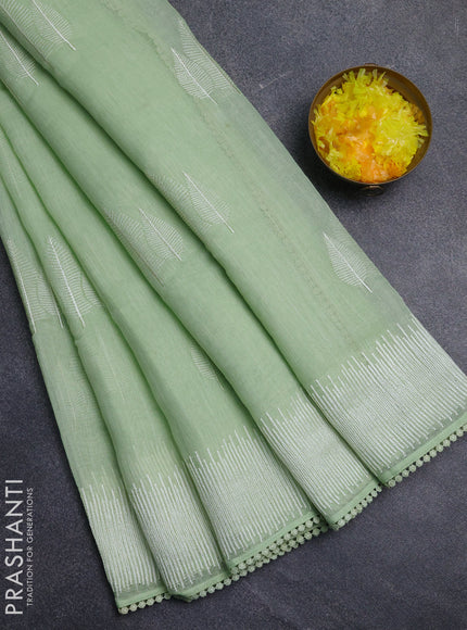Linen cotton saree pista green with embroidery buttas and embroidered border
