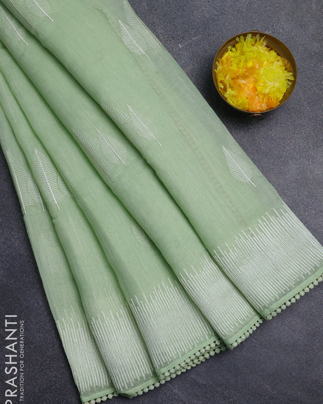 Linen cotton saree pista green with embroidery buttas and embroidered border