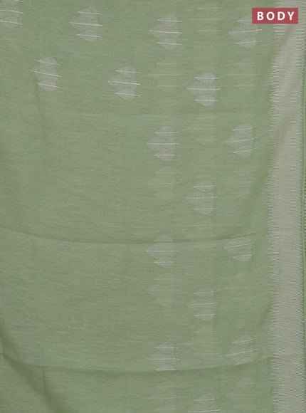 Linen cotton saree pista green with embroidery buttas and embroidered border