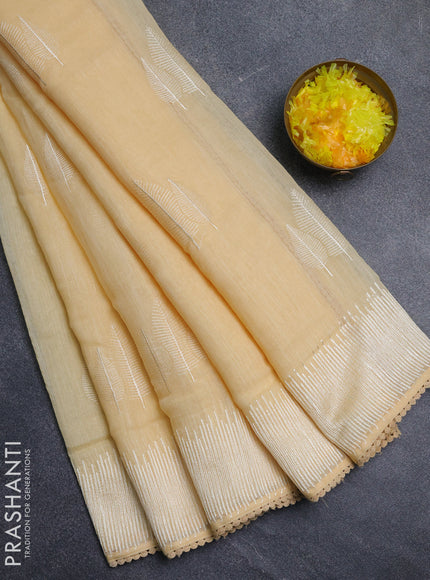 Linen cotton saree pale yellow with embroidery buttas and embroidered border
