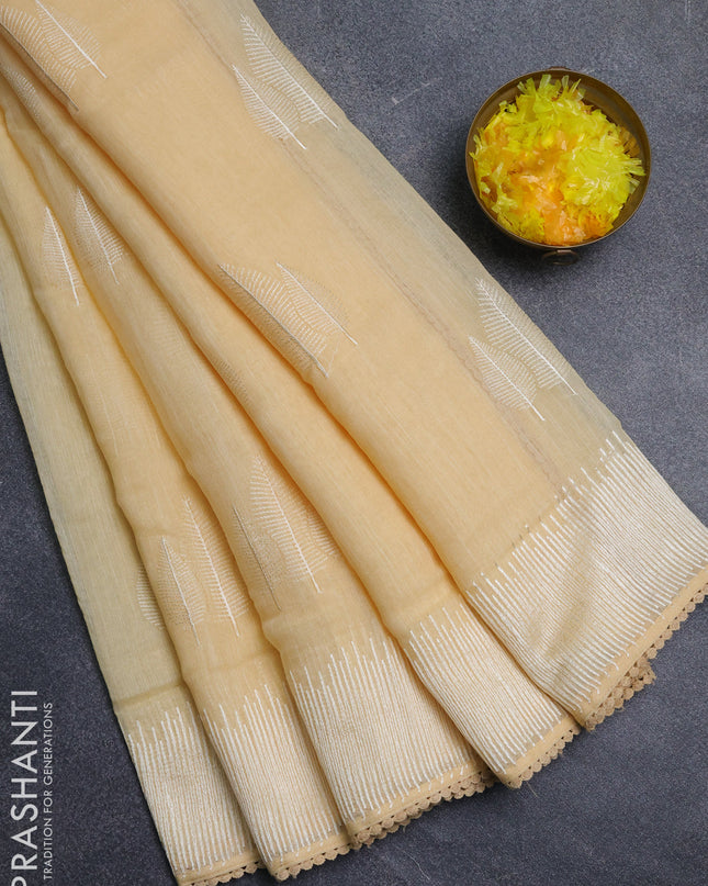Linen cotton saree pale yellow with embroidery buttas and embroidered border