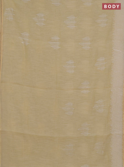 Linen cotton saree pale yellow with embroidery buttas and embroidered border