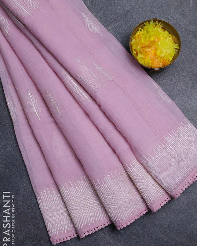 Linen cotton saree light pink with embroidery buttas and embroidered border