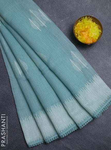 Linen cotton saree teal shade with embroidery buttas and embroidered border