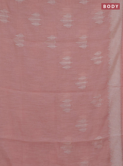Linen cotton saree peach shade with embroidery buttas and embroidered border