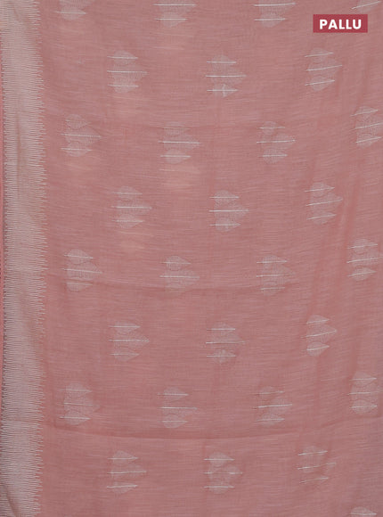 Linen cotton saree peach shade with embroidery buttas and embroidered border
