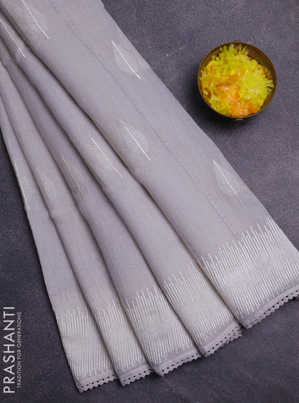 Linen cotton saree grey with embroidery buttas and embroidered border