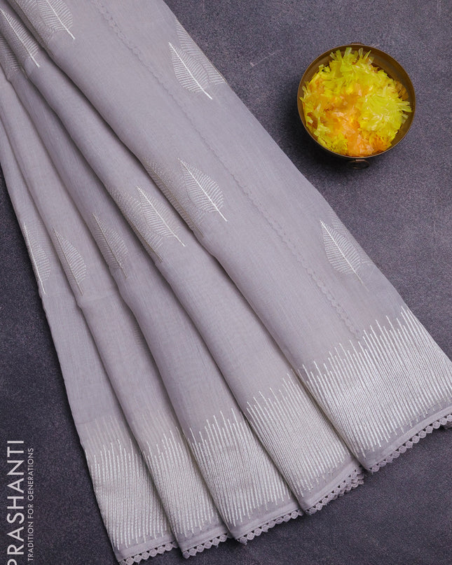Linen cotton saree grey with embroidery buttas and embroidered border