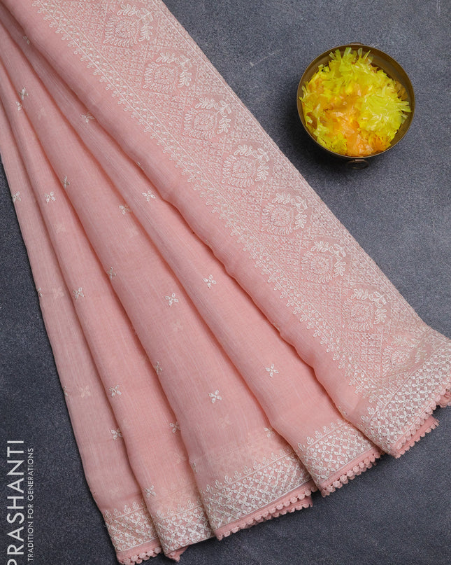 Linen cotton saree peach pink with embroidery buttas and embroidered border