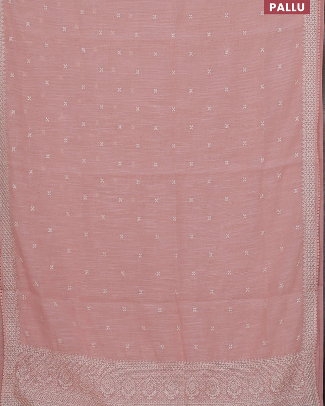 Linen cotton saree peach pink with embroidery buttas and embroidered border