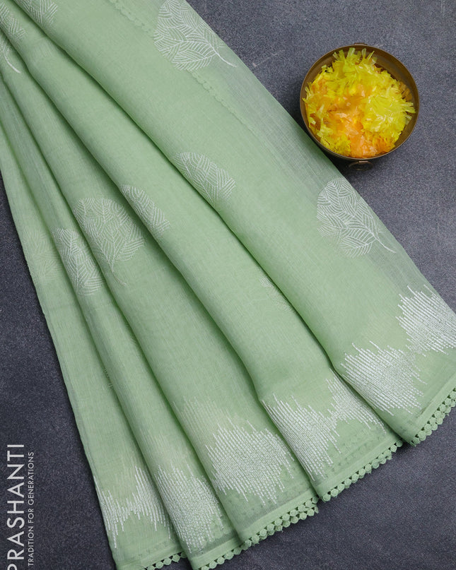 Linen cotton saree pista green with embroidery buttas and embroidered border