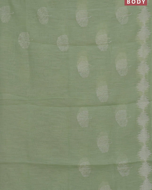 Linen cotton saree pista green with embroidery buttas and embroidered border