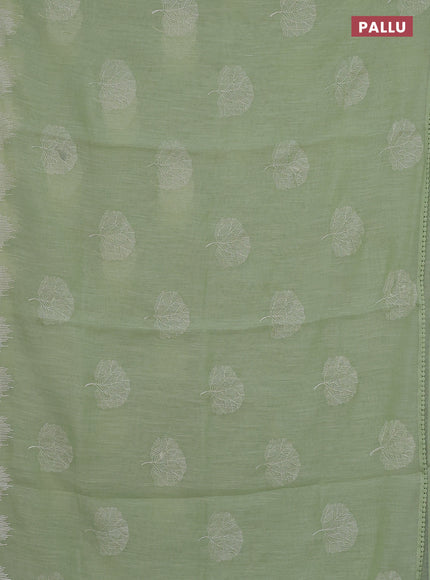 Linen cotton saree pista green with embroidery buttas and embroidered border
