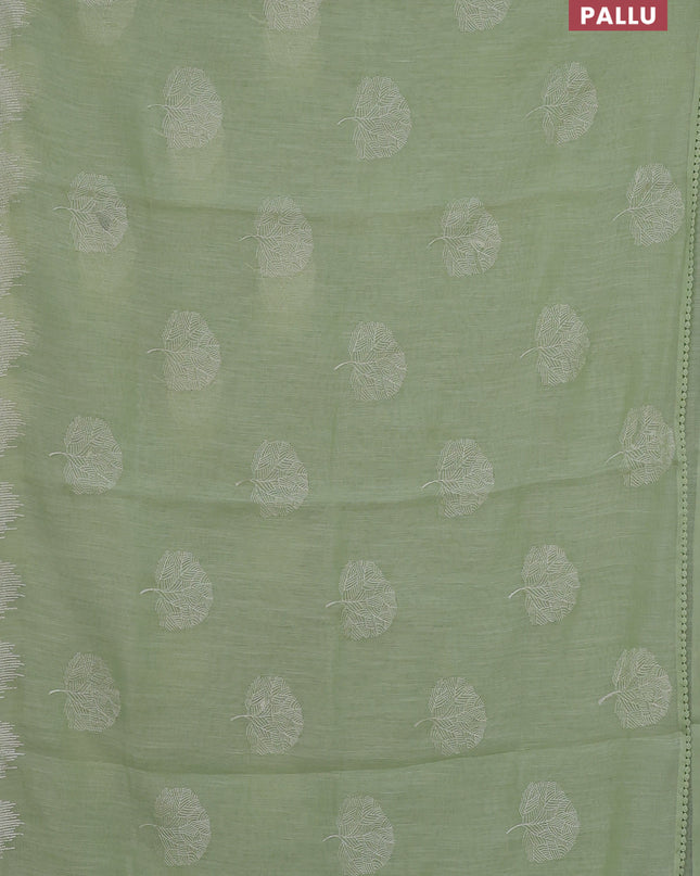 Linen cotton saree pista green with embroidery buttas and embroidered border
