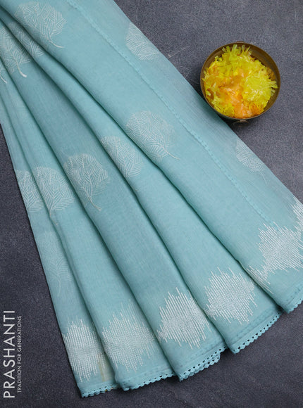 Linen cotton saree pastel blue with embroidery buttas and embroidered border