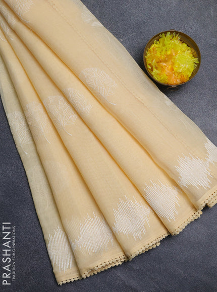 Linen cotton saree pale yellow with embroidery buttas and embroidered border