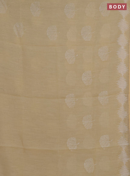 Linen cotton saree pale yellow with embroidery buttas and embroidered border