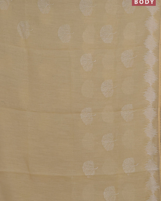 Linen cotton saree pale yellow with embroidery buttas and embroidered border