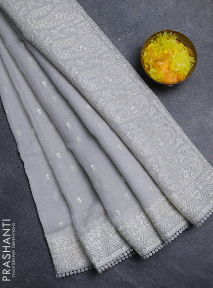 Linen cotton saree pastel grey with embroidery buttas and embroidered border