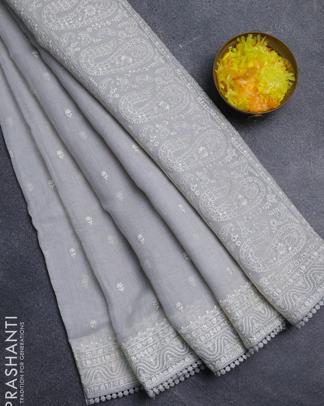 Linen cotton saree pastel grey with embroidery buttas and embroidered border