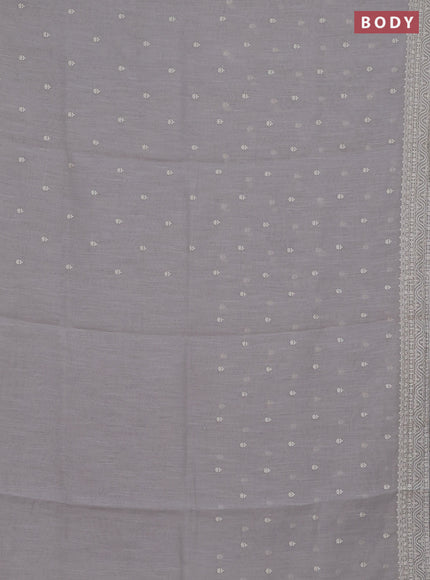 Linen cotton saree pastel grey with embroidery buttas and embroidered border