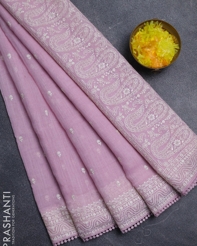 Linen cotton saree light pink with embroidery buttas and embroidered border
