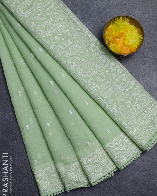 Linen cotton saree pista green with embroidery buttas and embroidered border