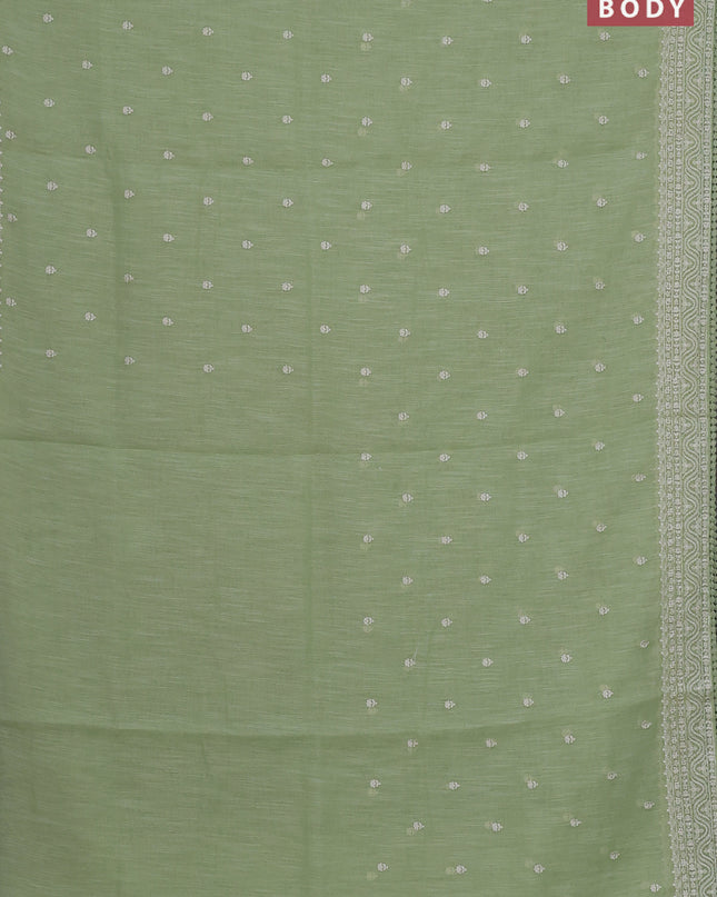 Linen cotton saree pista green with embroidery buttas and embroidered border