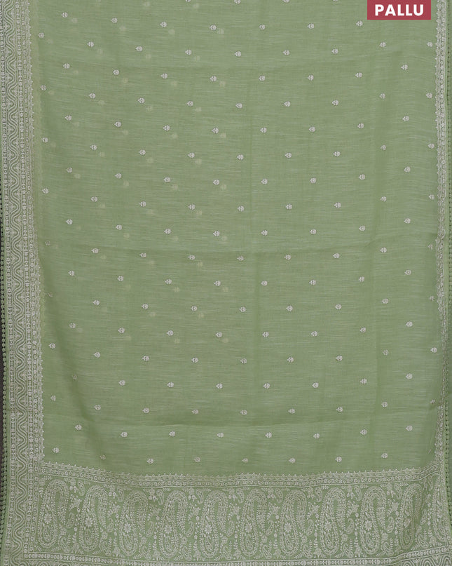 Linen cotton saree pista green with embroidery buttas and embroidered border