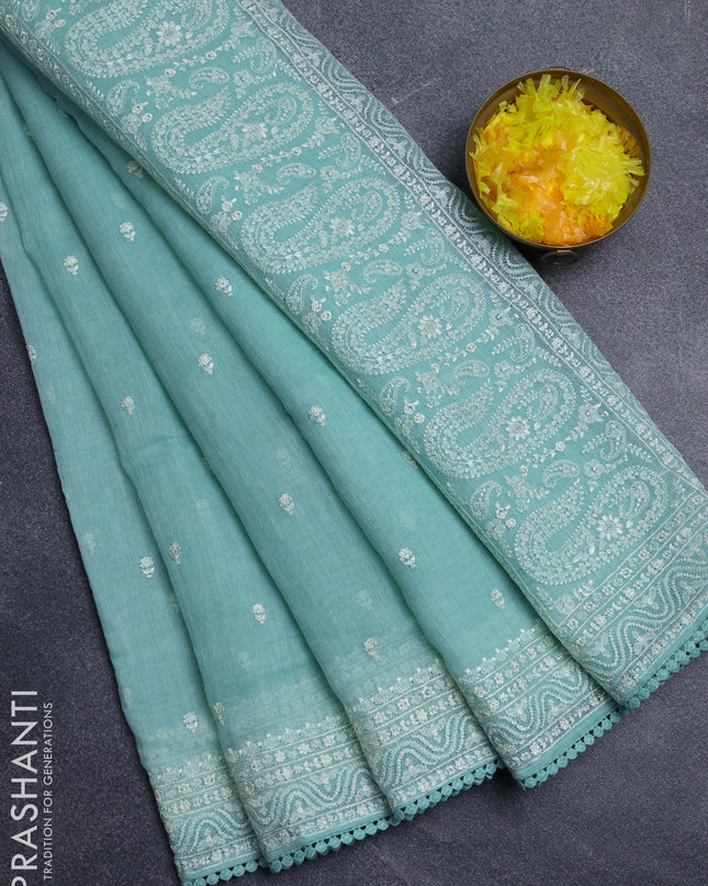 Linen cotton saree teal shade with embroidery buttas and embroidered border