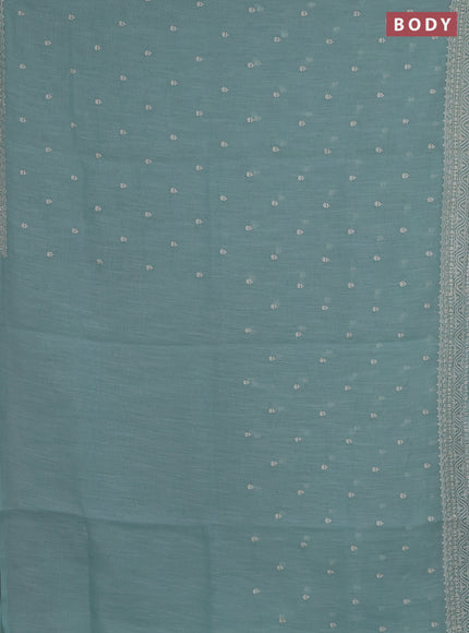 Linen cotton saree teal shade with embroidery buttas and embroidered border